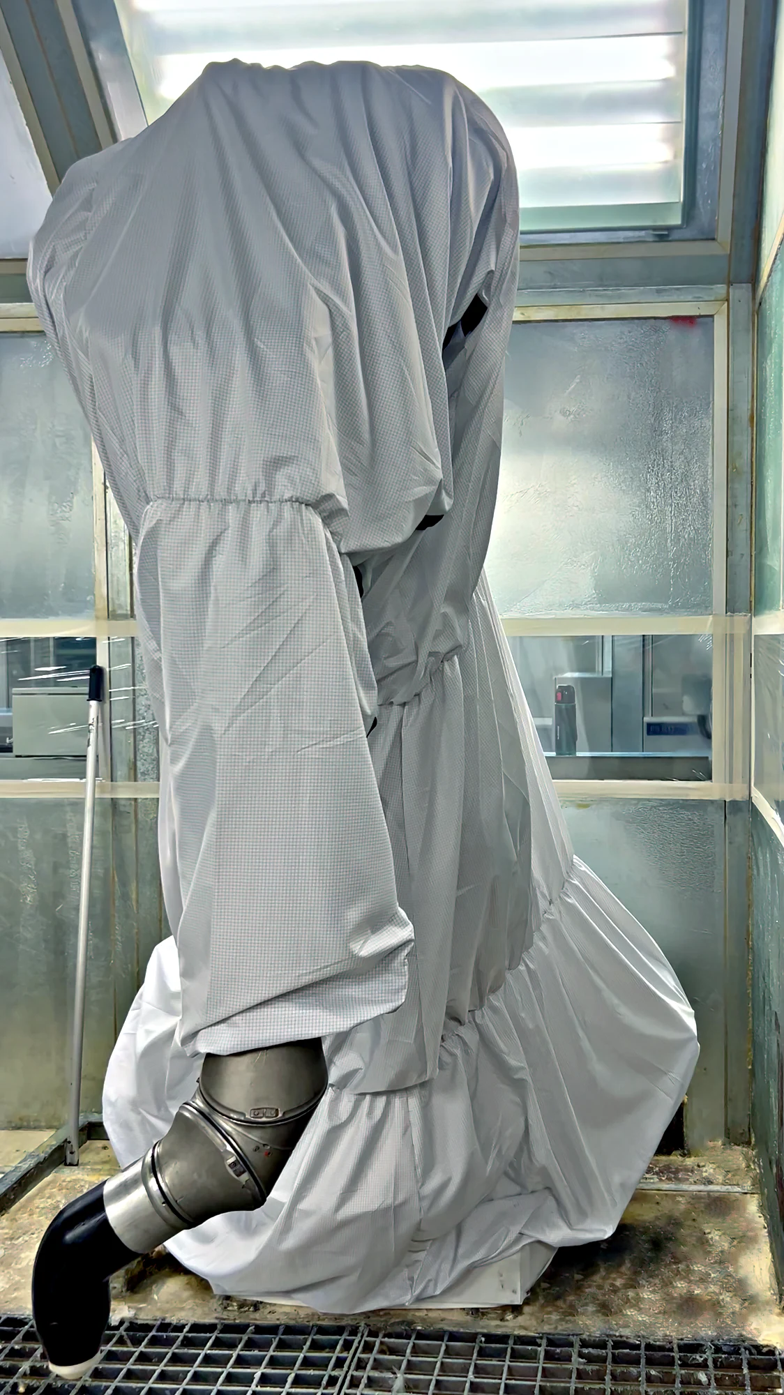 ATEX ZeroSpray protective cover installed on a painting robot inside a paint booth